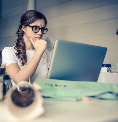 Woman thinking about unsecured personal loan Woman thinking about unsecured personal loan